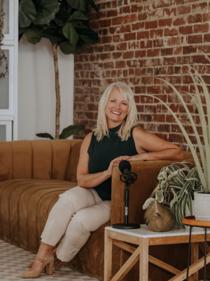 Branding image on couch with mic